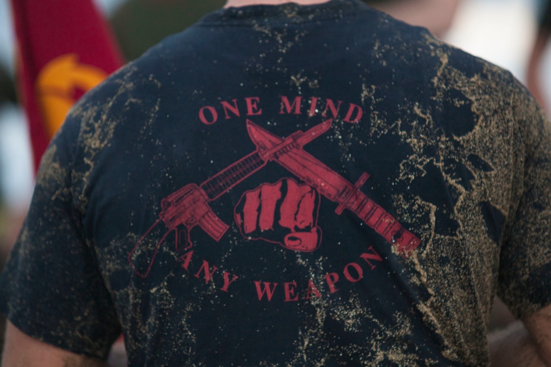 Cpl. David Waisner, a combat engineer with Combat Assault Company (CAC), 3rd Marine Regiment, grapples with another Marine for the 74th anniversary of the Battle of Tarawa, Fort Hase Beach, Marine Corps Base Hawaii (MCBH), Nov. 20, 2017. CAC celebrated the anniversary with a motivational run and beach grappling to promote comradery among the Marines, while understanding the sacrifices at Tarawa. MCBH, along with its tenant units, strives to promote resiliency in remembering the past battles won and to instill in the newest generation what it means to be U.S. Marine.