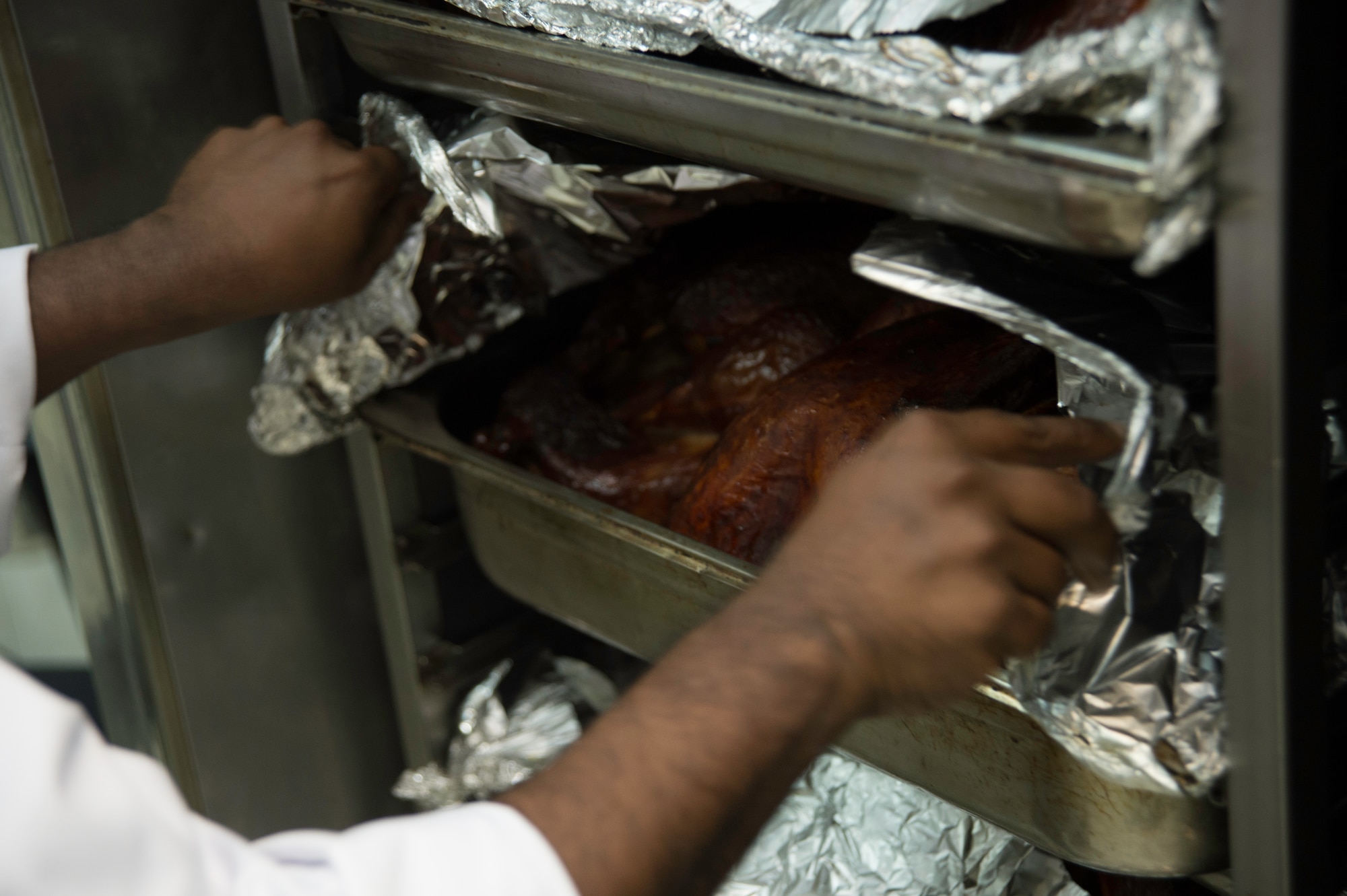 The 386th AEW, Expeditionary Force Support Squadron, cook for approximately 7,000 Airmen, soldiers, civilians and coalition forces daily
