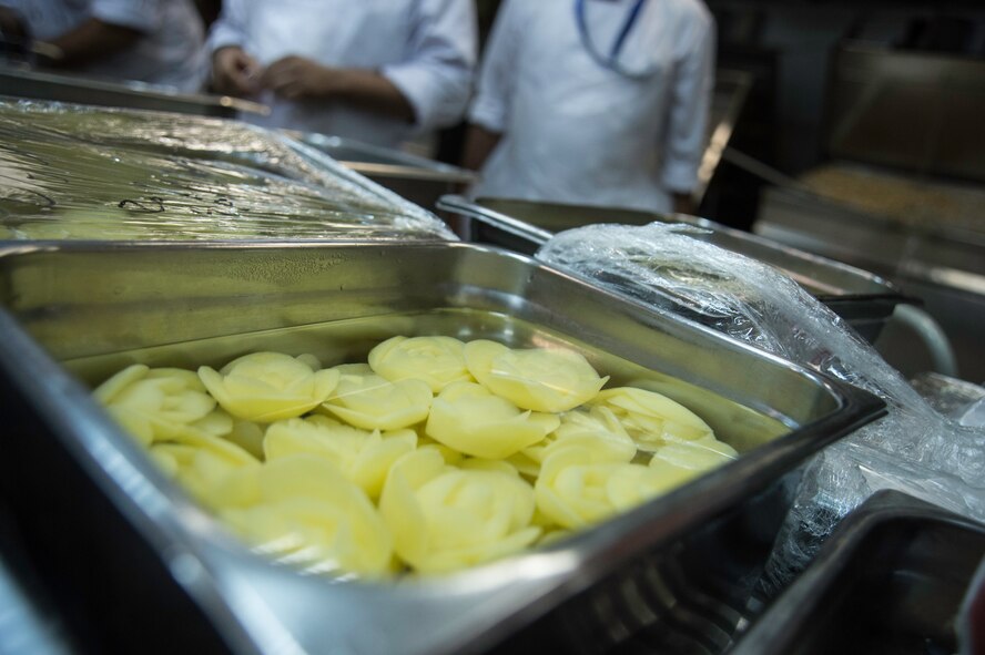 The 386th AEW, Expeditionary Force Support Squadron, cook for approximately 7,000 Airmen, soldiers, civilians and coalition forces daily