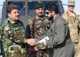 An Afghan Air Force pilot receives a certificate during a UH-60 Black Hawk Aircraft Qualification Training graduation ceremony at Kandahar Airfield, Afghanistan, Nov. 20, 2017. The pilot is one of six to be the first AAF Black Hawk pilots. The first AAF Black Hawk pilots are experienced aviators coming from a Mi-17 background. For future Black Hawk pilots the UH-60 flight training is approximately 16 weeks long, six weeks for Aircraft Qualification Training (AQT) and 10 weeks for Mission Qualification Training (MQT).  (U.S. Air Force photo by Tech. Sgt. Veronica Pierce)