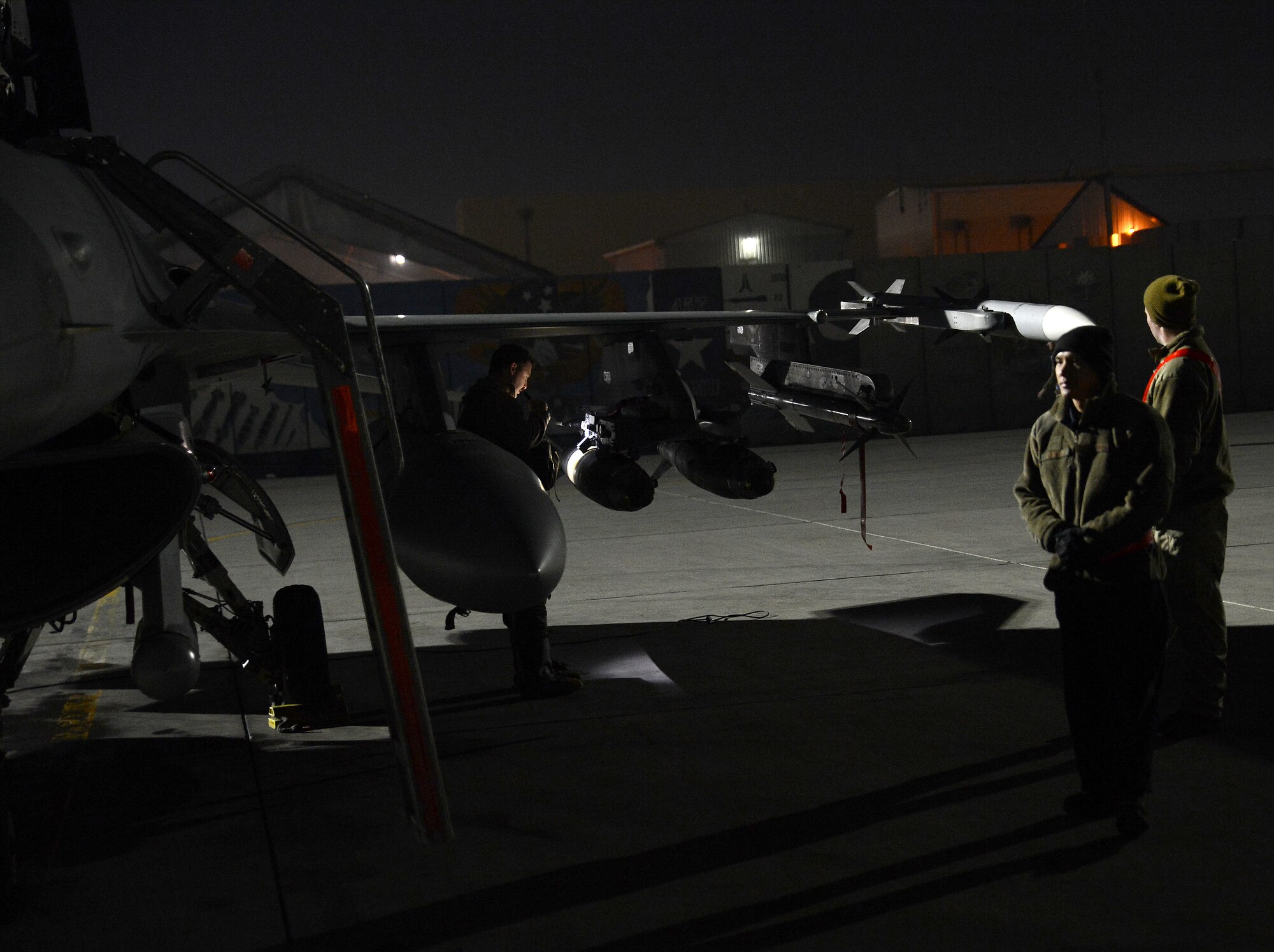 U.S. Airmen with the 455th Expeditionary Aircraft Maintenance Squadron prepare an F-16 fighting falcon assigned to the 77th Fighter Squadron for takeoff Nov. 21, 2017 at Bagram Airfield, Afghanistan.