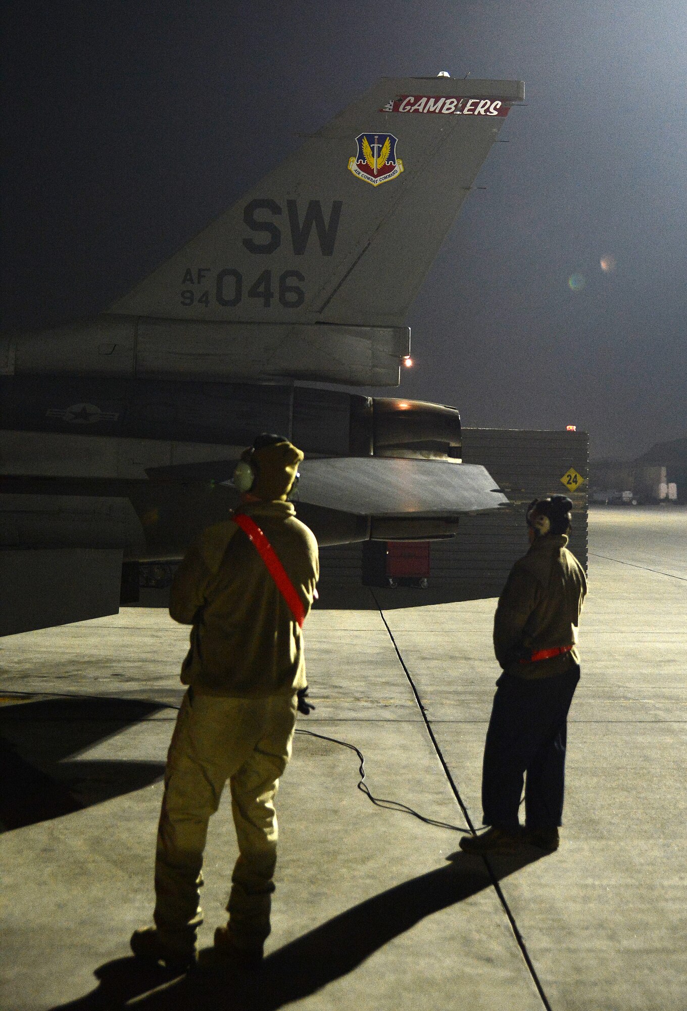 U.S. Airmen with the 455th Expeditionary Aircraft Maintenance Squadron prepare an F-16 fighting falcon assigned to the 77th Fighter Squadron for takeoff Nov. 21, 2017 at Bagram Airfield, Afghanistan.