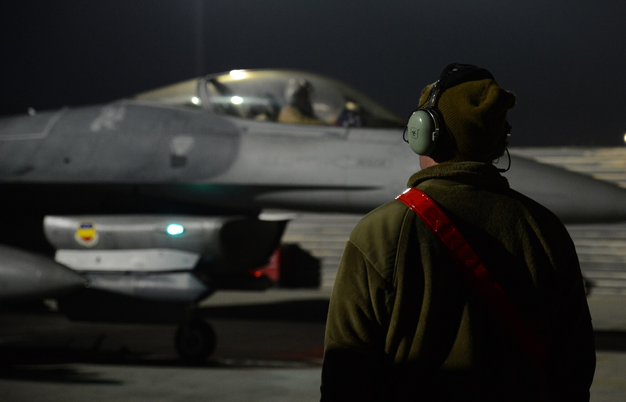 U.S. Airmen with the 455th Expeditionary Aircraft Maintenance Squadron prepare an F-16 fighting falcon assigned to the 77th Fighter Squadron for takeoff Nov. 21, 2017 at Bagram Airfield, Afghanistan.