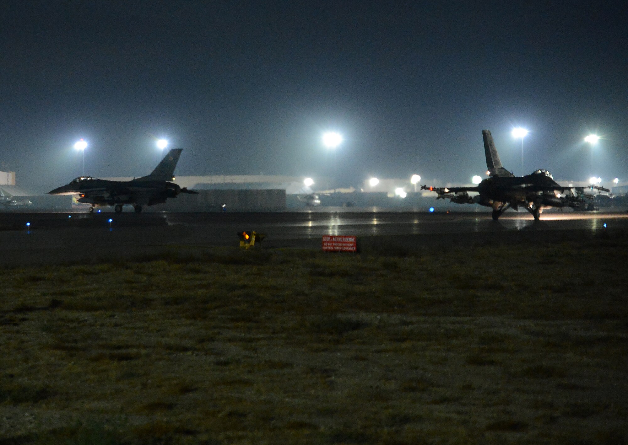 F-16 fighting falcons assigned to the 77th Fighter Squadron taxi down the runway Nov. 21, 2017 at Bagram Airfield, Afghanistan.