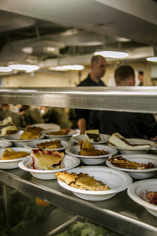 Assorted pieces of pies are displayed on a salad bar as part of a Thanksgiving meal  for Marines and Sailors of Fox Company, 2nd Battalion, 6th Marine Regiment, 26th Marine Expeditionary Unit (MEU), and Sailors assigned to the dock landing ship USS Oak Hill (LSD 51) while underway NOv. 23, 2017, during Combined Composite Training Unit Exercise (COMPTUEX). Combined COMPTUEX serves as the capstone event for the Amphibious Ready Group-MEU team prior to a deployment, fully integrating the ARG-MEU team as an amphibious force and testing their ability to execute missions across a range of military operations. (U.S. Marine Corps photo by Staff Sgt. Dengrier M. Baez)