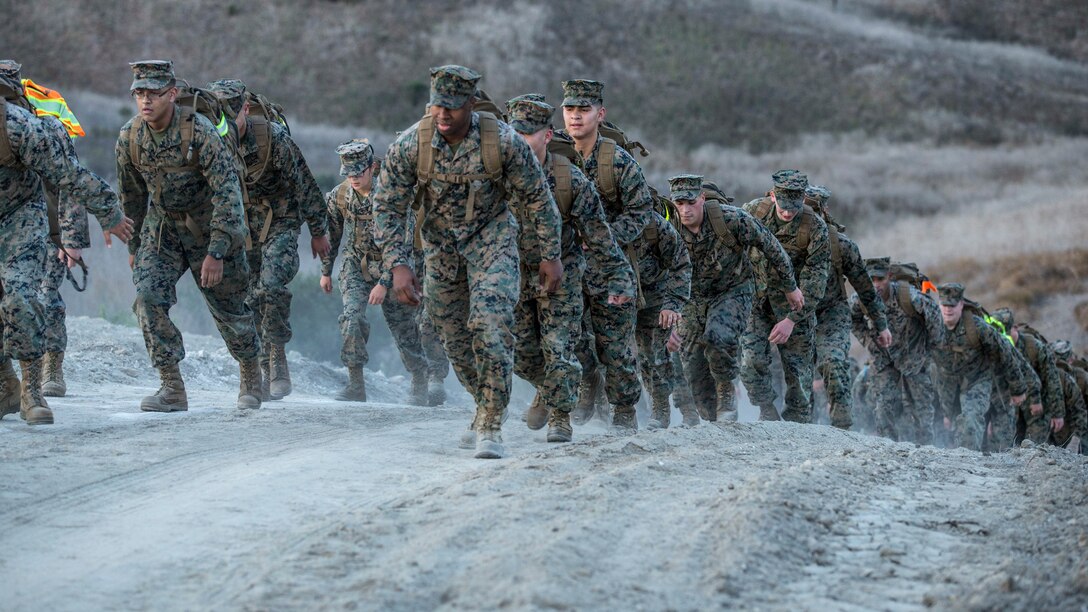 Marines hike on Marine Corps Air Station Camp Pendleton, Calif.