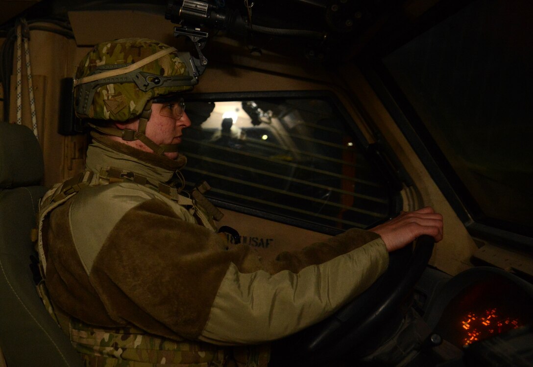 Senior Airman Maria Joyce, 455th Expeditionary Security Forces Squadron Echo sector command controller, patrols the flight line driving a Mine-Resistant Ambush Protected Nov. 23, 2017 at Bagram Airfield, Afghanistan.
