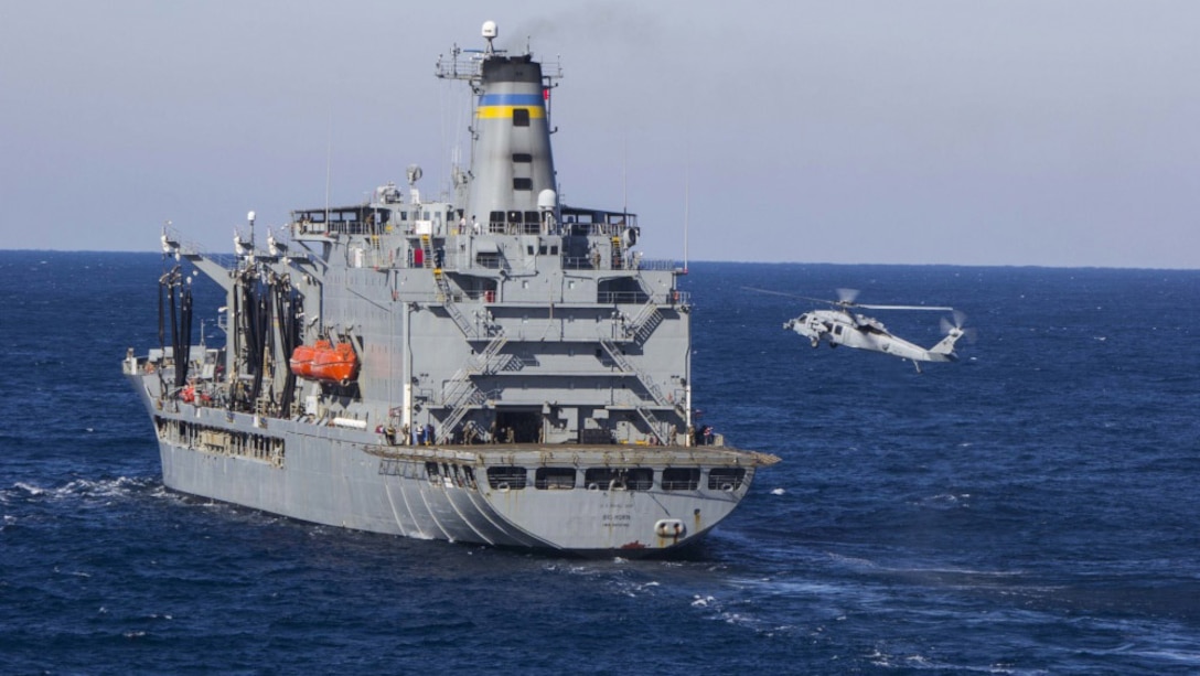 A U.S. Navy MH-60S Seahawk with Helicopter Sea Combat Squadron 28, Detachment 4, prepares to land on the USNS Big Horn during a simulated visit, board, search and seizure in the Atlantic Ocean, Nov. 25, 2017. The MRF conducted the VBSS as part of Combined COMPTUEX to certify the Iwo Jima Amphibious Ready Group (ARG)/MEU team in maritime operations for an upcoming deployment at sea.