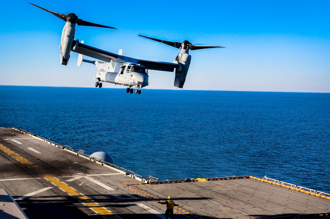 A Marine Corps MV-22B Osprey takes off from the amphibious assault ship USS Iwo Jima.