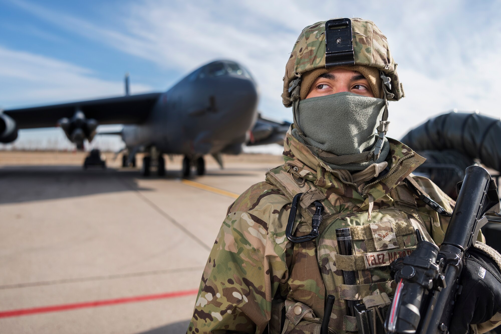 Airman 1st Class Reinaldo Velez-Nazario, 5th Security Forces Squadron defender, stands guard at Minot Air Force Base, N.D., Oct. 31, 2017, during Global Thunder 18. Exercise Global Thunder is an annual command and control and field training exercise designed to train Department of Defense forces and assess joint operational readiness across all of USSTRATCOM’s mission areas, with a specific focus on nuclear readiness. (U.S. Air Force photo by Senior Airman J.T. Armstrong)