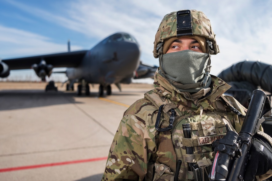 Airman 1st Class Reinaldo Velez-Nazario, 5th Security Forces Squadron defender, stands guard at Minot Air Force Base, N.D., Oct. 31, 2017, during Global Thunder 18. Exercise Global Thunder is an annual command and control and field training exercise designed to train Department of Defense forces and assess joint operational readiness across all of USSTRATCOM’s mission areas, with a specific focus on nuclear readiness. (U.S. Air Force photo by Senior Airman J.T. Armstrong)