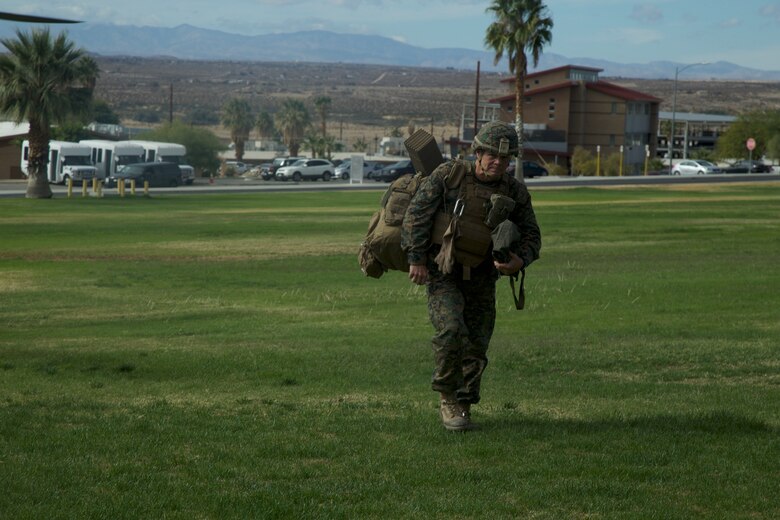 Gen. Robert B. Neller, Commandant of the Marine Corps, walks across Lance Cpl. Torrey L. Gray Field after disembarking from a UH-1Y Venom aboard the Marine Corps Air Ground Combat Center, Twentynine Palms, Calif.,  Nov. 17, 2017.  Neller was at the Combat Center to observe Integrated Training Exercise 1-18. (U.S. Marine Corps photo by Lance Cpl. Preston L. Morris)