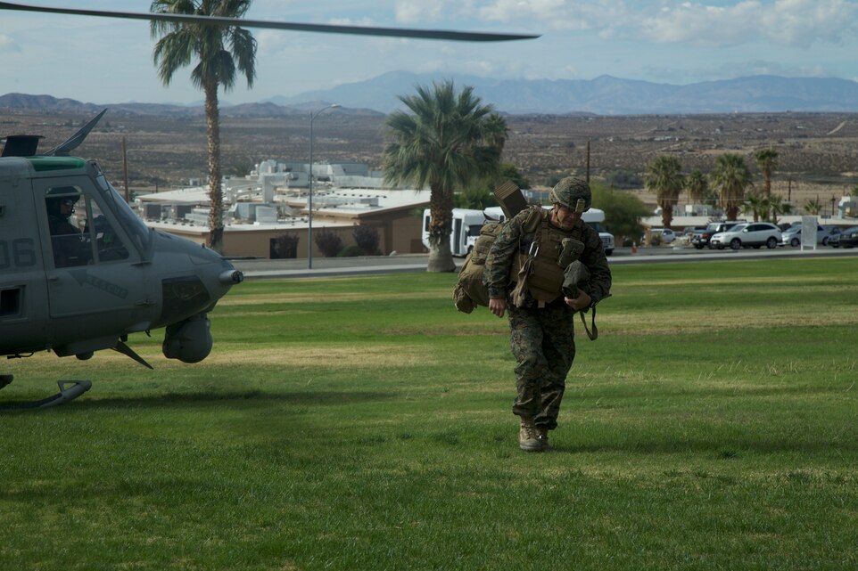 Gen. Robert B. Neller, Commandant of the Marine Corps, walks across Lance Cpl. Torrey L. Gray Field after disembarking from a UH-1Y Venom aboard the Marine Corps Air Ground Combat Center, Twentynine Palms, Calif.,  Nov. 17, 2017.  Neller was at the Combat Center to observe Integrated Training Exercise 1-18. (U.S. Marine Corps photo by Lance Cpl. Preston L. Morris)