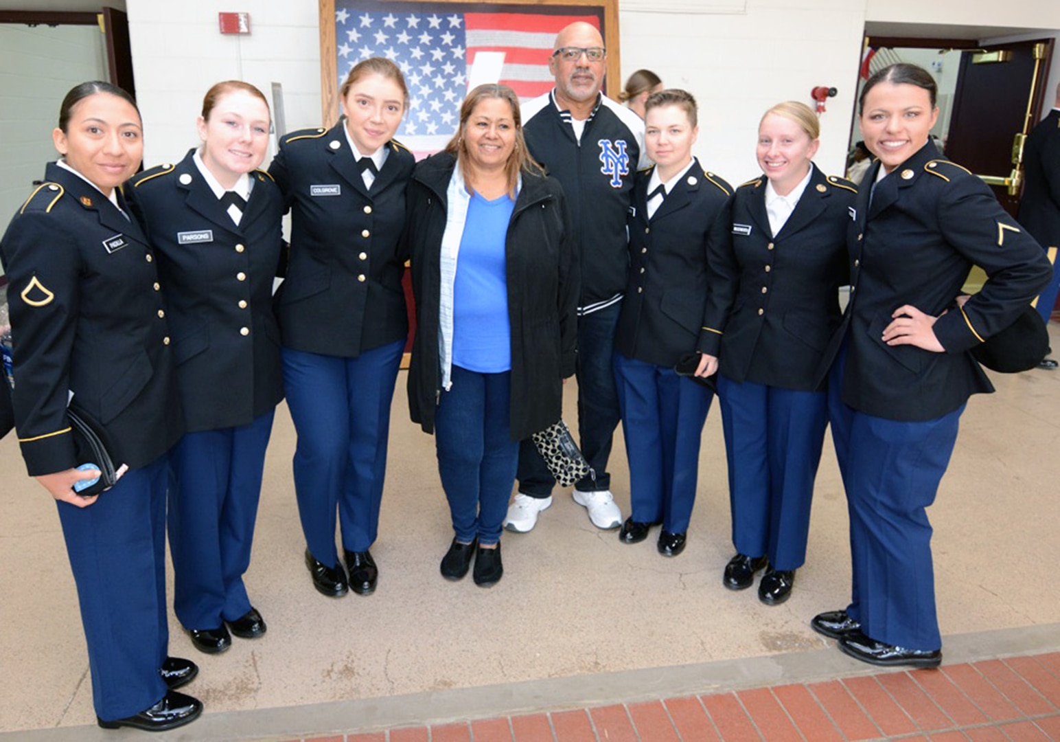 Martha and Eddie Matos with Pvt. Jaqueline Padilla from Victorville, Calif.; Pvt. Katlin Parsons from Huntsville, Ala.; Pvt Catlin Colgrove from Indianapolis, Ind.; Pvt. Destiny Watts from Union City, Tenn.; Pvt. Britani Woodworth from Kendall, Wisc.; and Private Lindy Wayland from Burton, Ill.