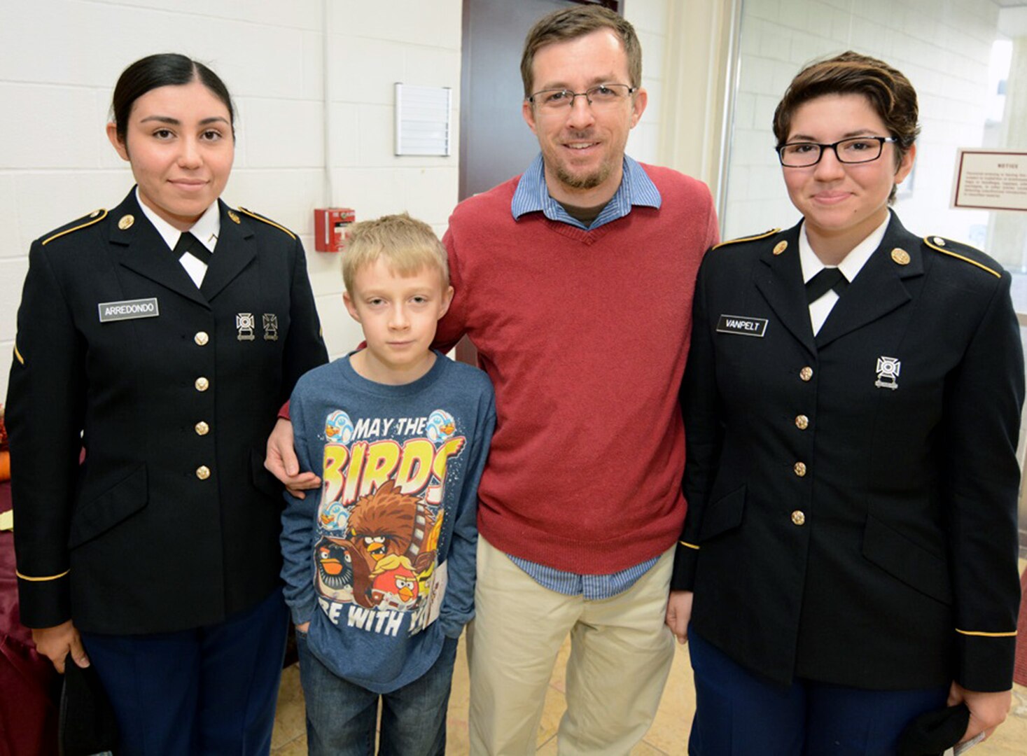 Jeff Wheatcraft with his son, Nelson, hosting Pvt. Adrianna Arredondo from Albuquerque, N.M.; and Pvt. Destiny Vanpelt from Michigan. This is the 10th year the Wheatcraft family has hosted Soldiers for Thanksgiving.