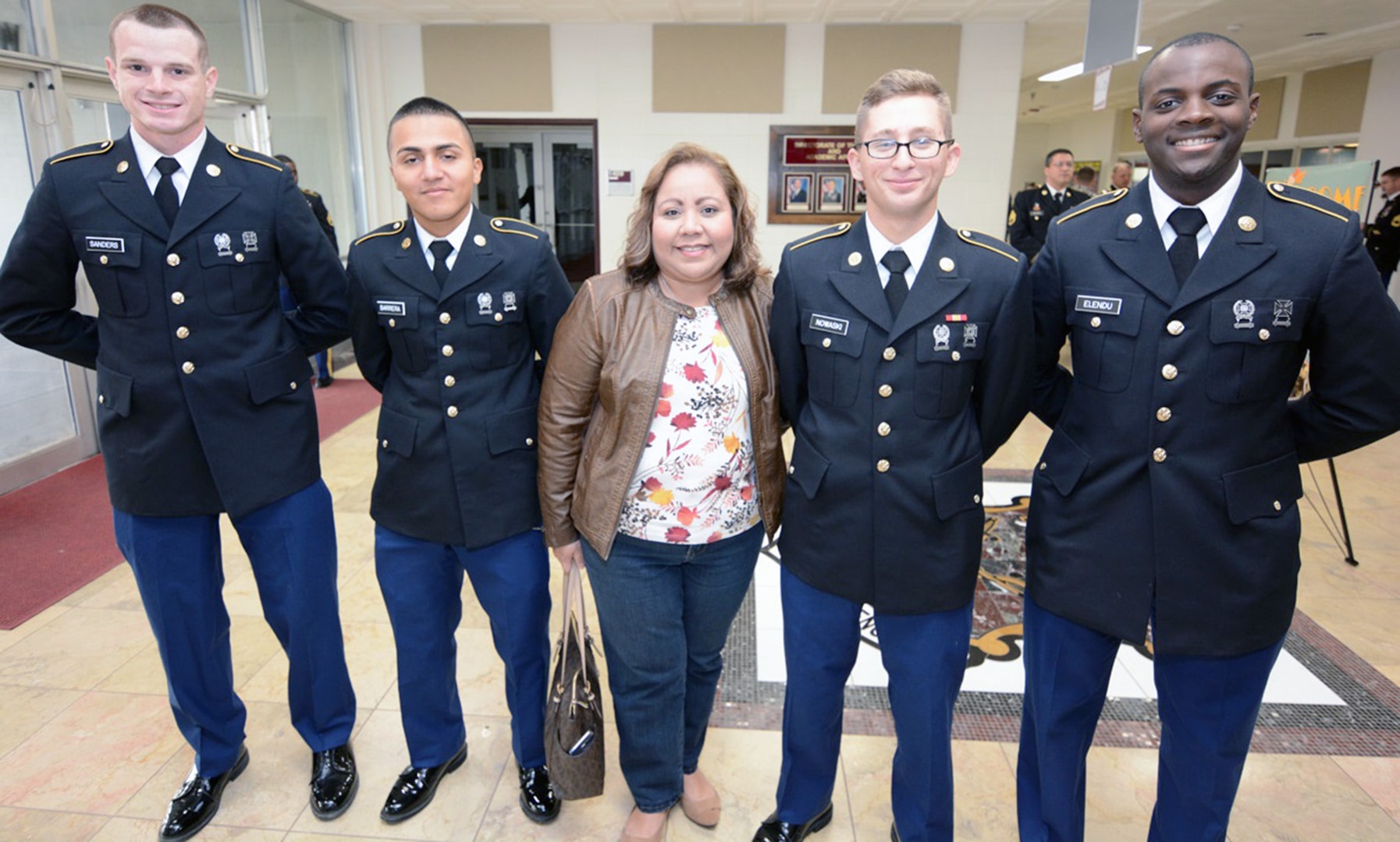 Alma Alvarado with Pvt. Joseph Sanders from Cheyanne, Wyo.; Pvt. Eric Barrera from Florida; Pvt. Kalyn Nowaski from Huntsville, Texas; and Pvt. David Elendu from Legos, Nigeria.