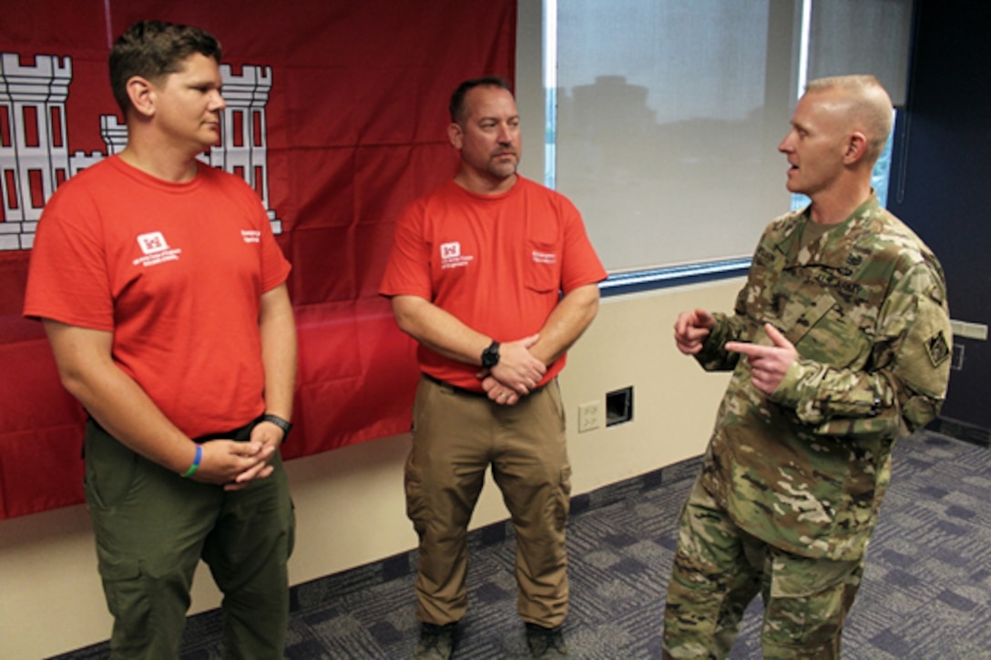 USACE Command Sergeant Major Bradley Houston speaks with Mobile District park rangers Mark Jackson, left, and Randall Flint, center, Nov. 8, 2017.