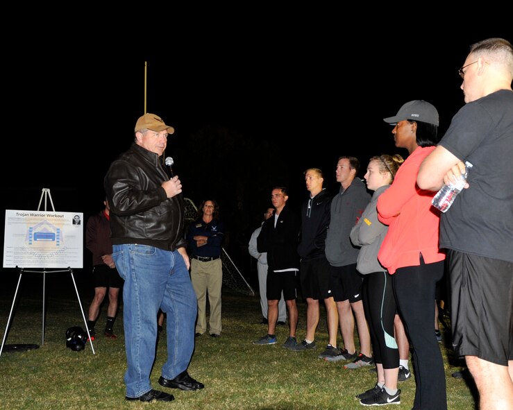 Retired Chief Master Sgt. Scott Dearduff addresses the Trojan Warrior Workout participants at Luke Air Force Base, Ariz., Nov. 27, 2017. Dearduff served with Maj. Troy gilbert before he died on Nov. 27, 2006. (U.S. Air Force photo/Airman 1st Class Pedro Mota)