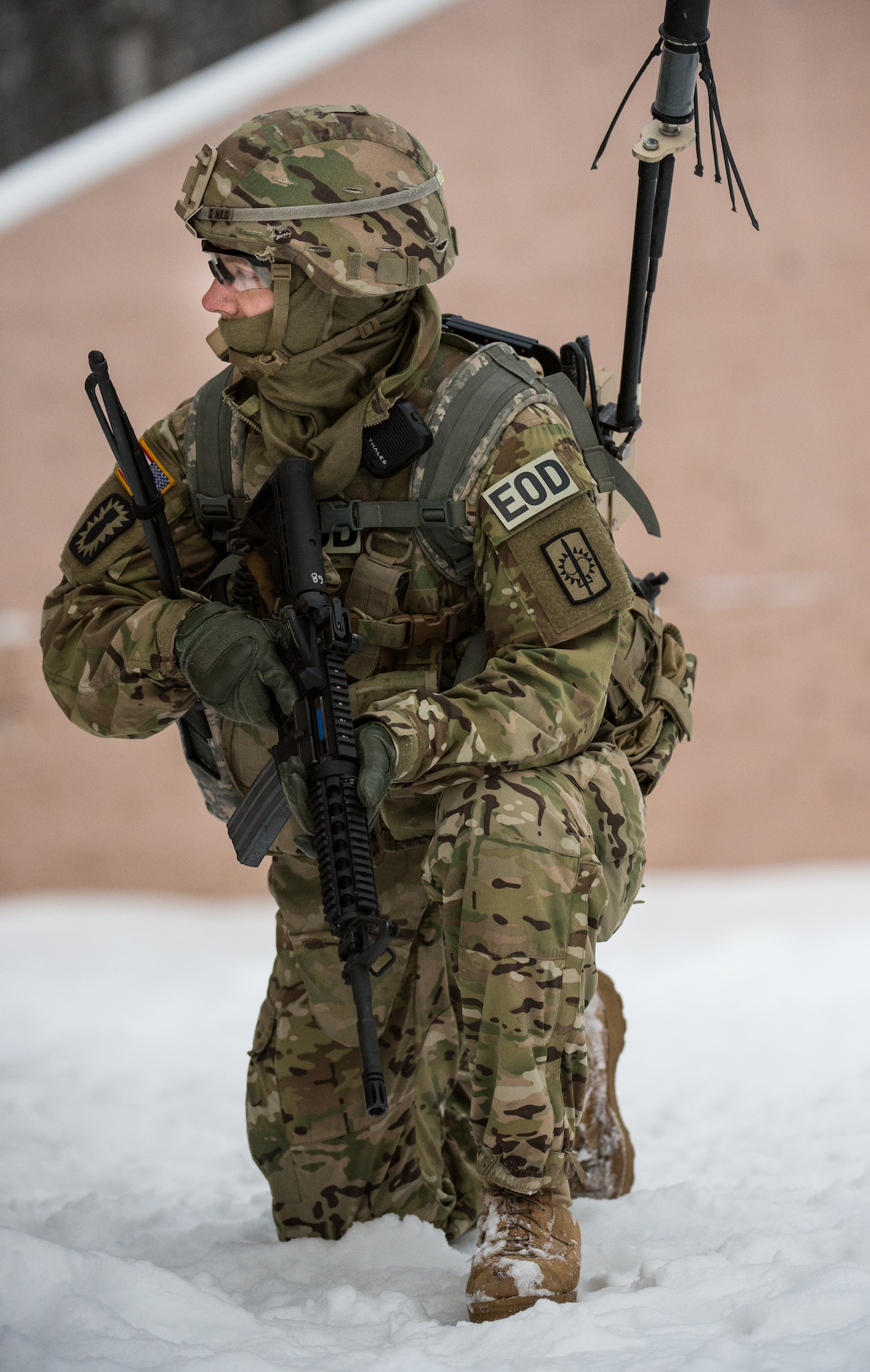 A Soldier assigned to the 716th Explosive Ordnance Disposal Company scans the area for threats after taking contact from opposition forces during a mass-casualty search-and-rescue training at Joint Base Elmendorf-Richardson, Alaska, Nov. 21, 2017. During the exercise, JBER Airmen and Soldiers located, assessed, treated and evacuated numerous casualties while engaging and eliminating multiple attacks from opposition forces. (U.S. Air Force photo by Senior Airman Curt Beach)