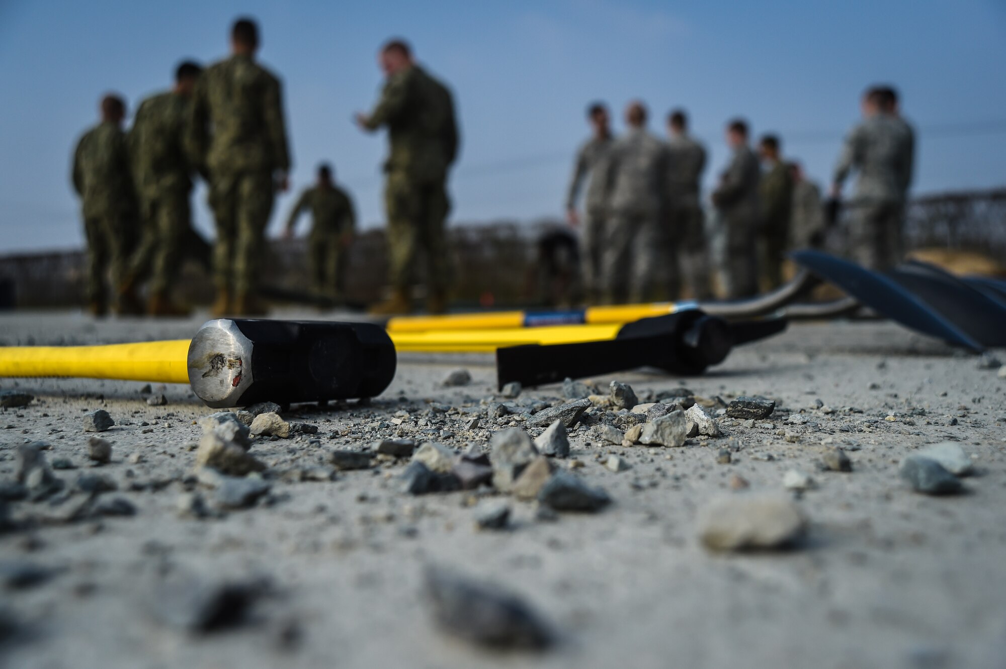 Tools are aligned on a mock airstrip during a Rapid Airfield Damage Repair bilateral training exercise at Gwangju Air Base, Republic of Korea, Nov. 8, 2017. U.S. and R.O.K. Airmen trained together for a week to learn the new RADR process, preparing them for response to wartime contingencies, enhancing interoperability and building partnership capacity in the Indo-Asia Pacific region. (U.S. Air Force photo by Senior Airman Curt Beach)
