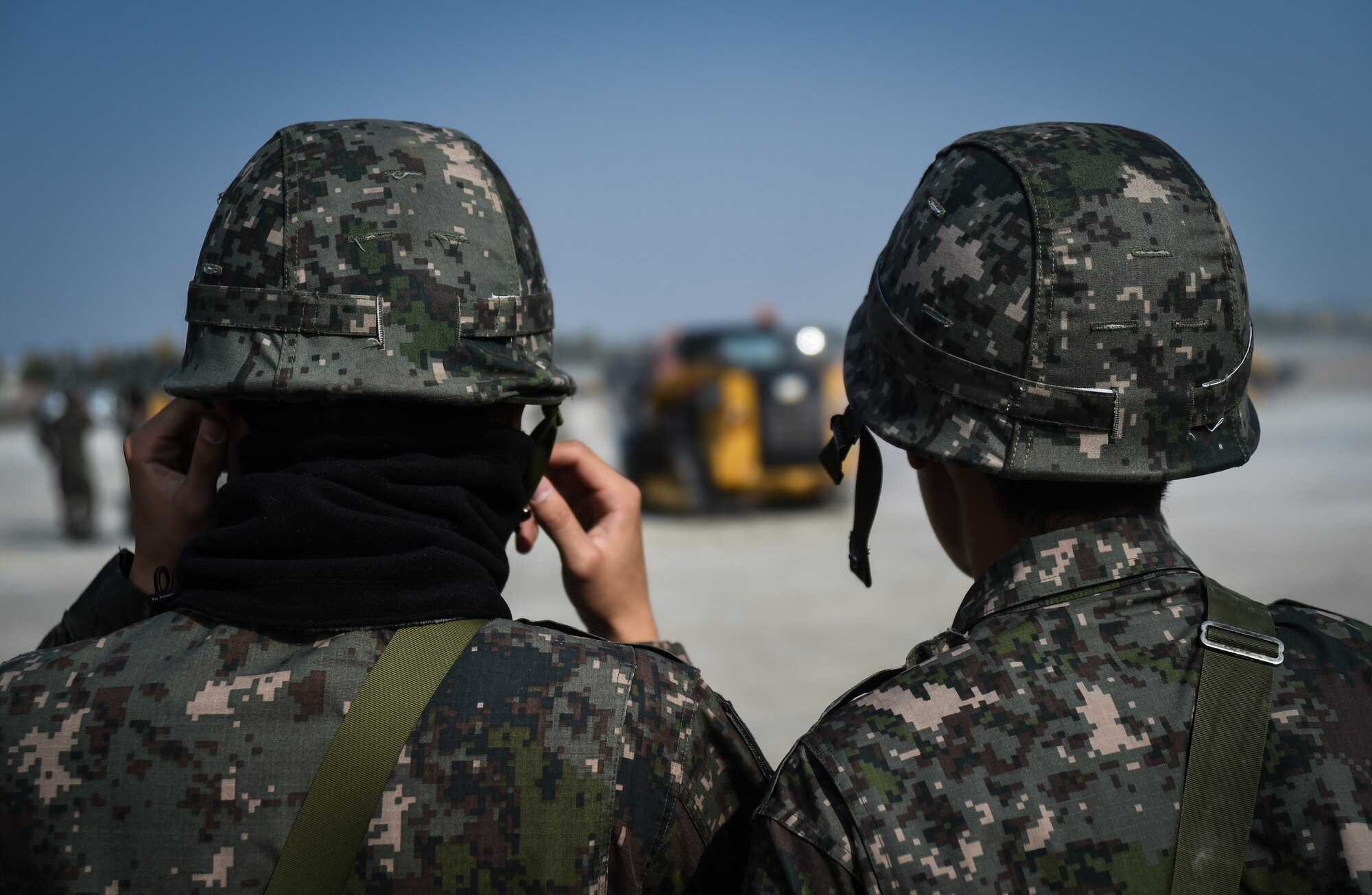 Republic of Korea Air Force Airmen participate in a Rapid Airfield Damage Repair bilateral training exercise at Gwangju Air Base, R.O.K., Nov. 8, 2017. U.S. and R.O.K. Airmen trained together for a week to learn the new RADR process, preparing them for response to wartime contingencies, enhancing interoperability and building partnership capacity in the Indo-Asia Pacific region. The new process makes use of rapid-setting concrete which enables vehicles to pass over it after one hour, and after two hours of cure time, it can support any and all aircraft. (U.S. Air Force photo by Senior Airman Curt Beach)