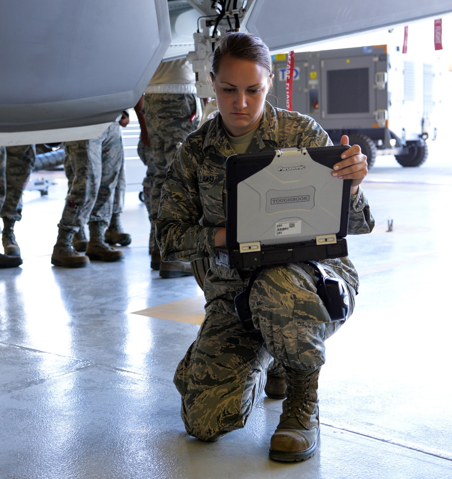 Senior Airman Samantha Calloway of the 419th Aircraft Maintenance Squadron at Hill Air Force Base, Utah, performs a routine inspection on an F-35A's internal weapons bay. There is a shortage of maintainers, like Calloway, throughout Air Force Reserve Command. (R. Nial Bradshaw)