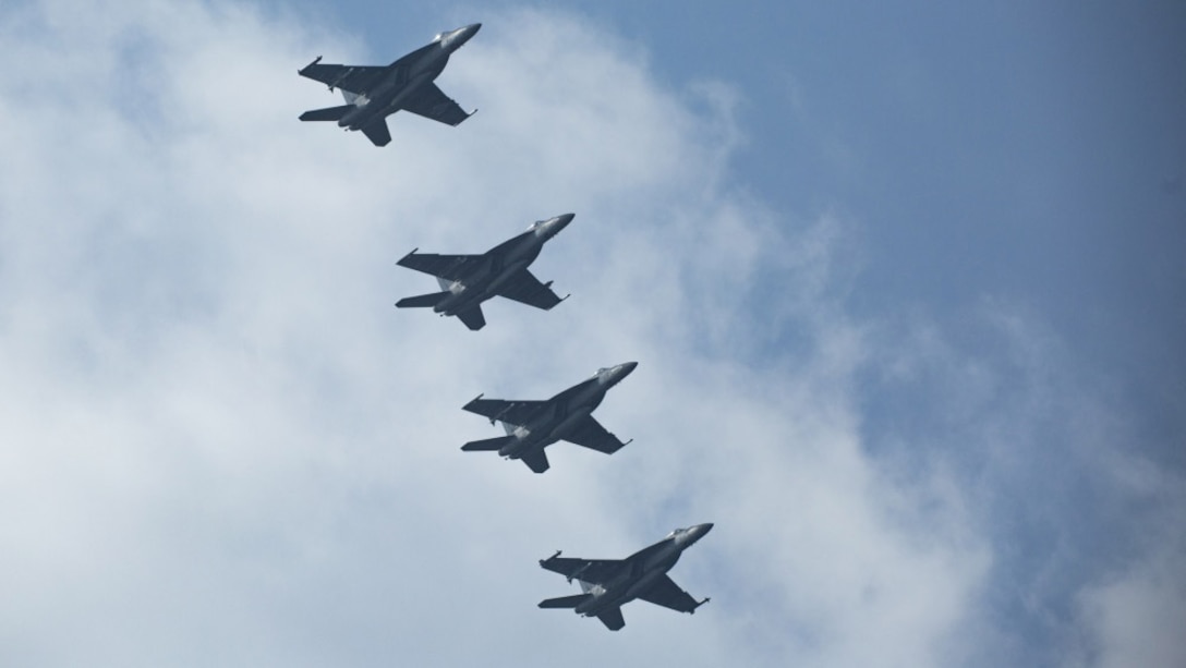 Four F/A-18E Super Hornets with Strike Fighter Squadron 195 prepare to land at Marine Corps Air Station Iwakuni, Japan, Nov. 28, 2017. VFA-195 arrived at MCAS Iwakuni as part of Carrier Air Wing 5’s relocation from Naval Air Facility Atsugi, Japan. The relocation of CVW-5 from NAF Atsugi to MCAS Iwakuni fulfills the final Defense Policy Review Initiative objective. The relocation is in accordance with the United States’ strategic vision for the rebalance in the Indo-Asia Pacific Region and does much to further strengthen the U.S.-Japan security alliance.