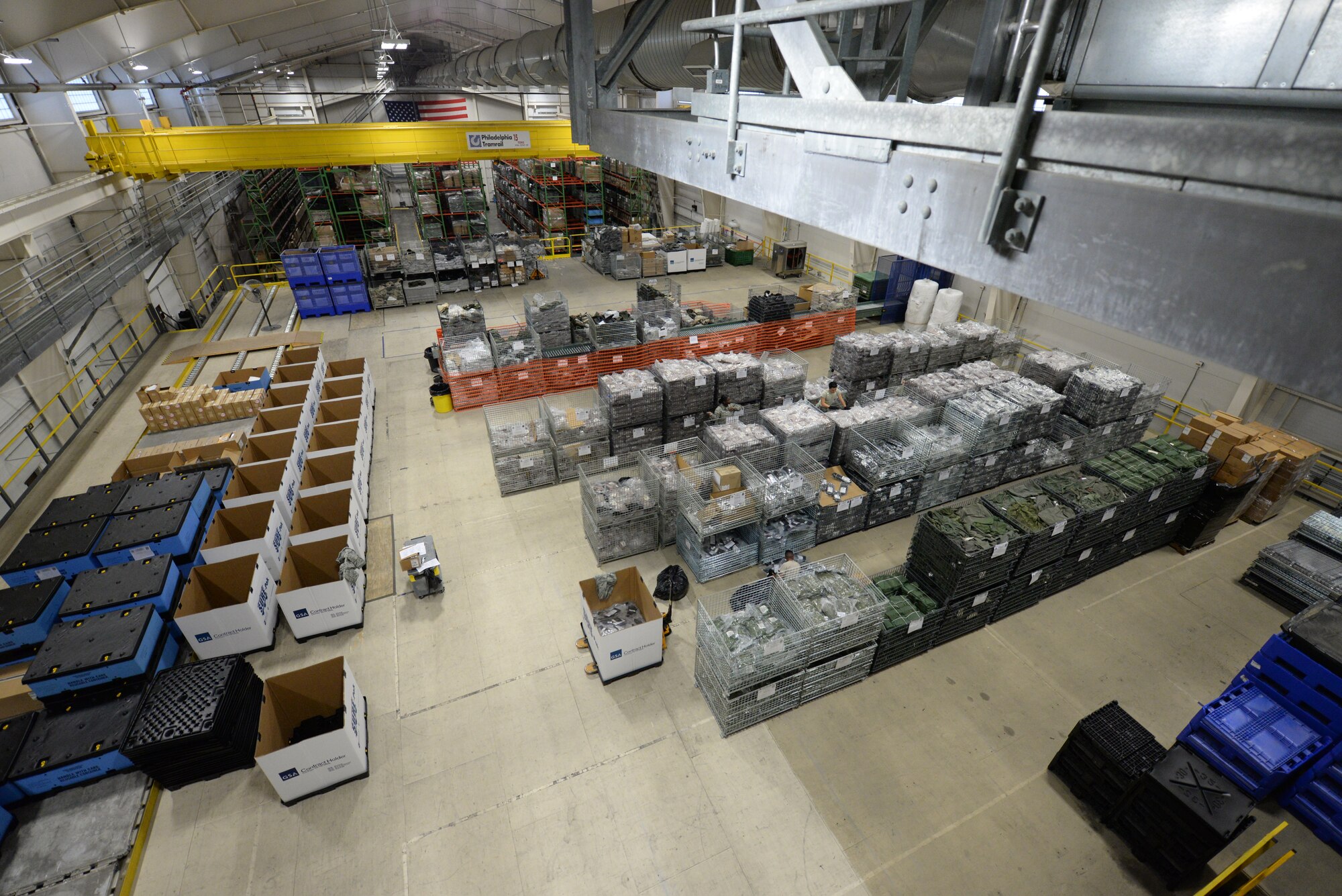 Members of the 436th Logistics Readiness Squadron individual protective equipment shop prepare chemical, biological, radiological and nuclear protective gear for a Civil Reserve Air Fleet readiness exercise Nov. 13, 2017, at Dover Air Force Base, Del. The 436th LRS is the only CRAF IPE repository in the DOD. (U.S. Air Force photo by Staff Sgt. Aaron J. Jenne)