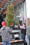 New York Guard helps load Christmas Trees for military families