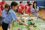 STEM students, parents and NSWC Crane volunteer coaches participated and volunteered at a FIRST Lego League (FLL) competition on Nov. 18 at the Lawrence County Boys and Girls Club as 130 students competed for a chance to move on to the State Tournament scheduled for Dec. 2 at the University of Southern Indiana.