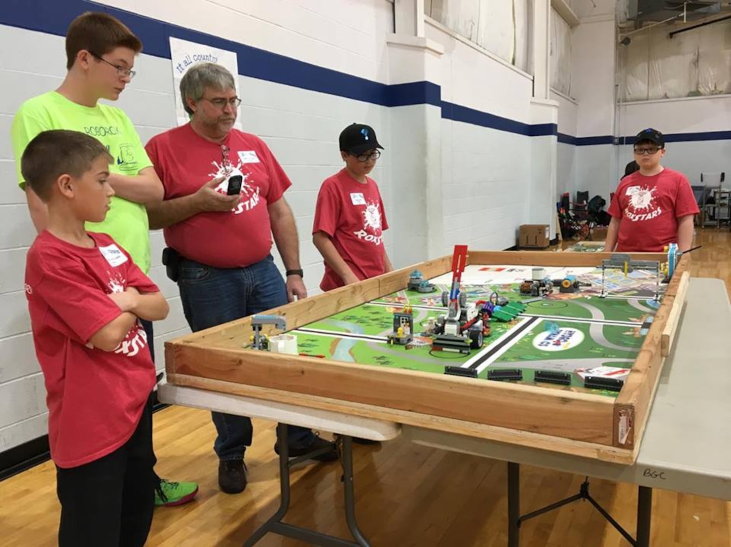 STEM students, parents and NSWC Crane volunteer coaches participated and volunteered at a FIRST Lego League (FLL) competition on Nov. 18 at the Lawrence County Boys and Girls Club as 130 students competed for a chance to move on to the State Tournament scheduled for Dec. 2 at the University of Southern Indiana.