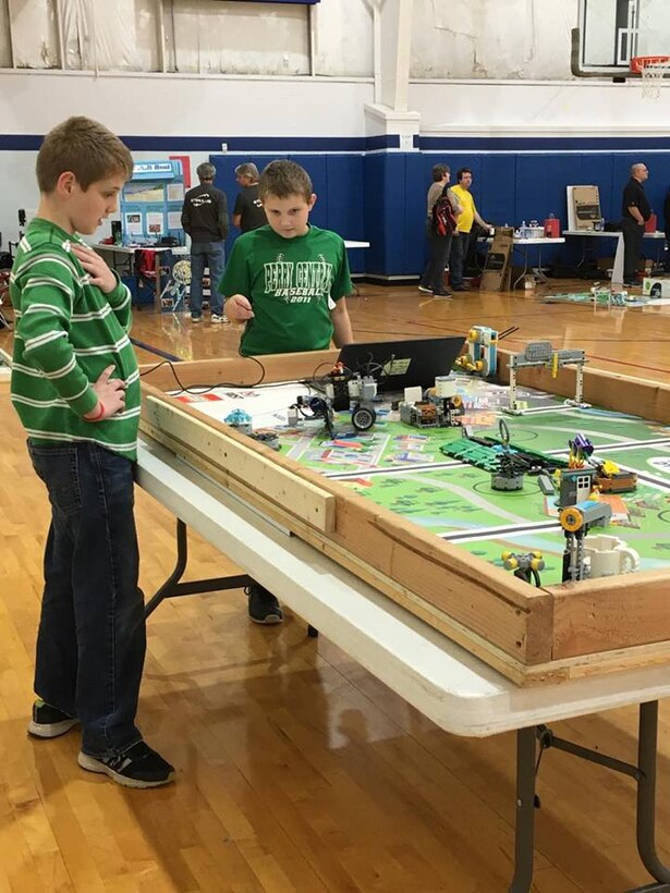 STEM students, parents and NSWC Crane volunteer coaches participated and volunteered at a FIRST Lego League (FLL) competition on Nov. 18 at the Lawrence County Boys and Girls Club as 130 students competed for a chance to move on to the State Tournament scheduled for Dec. 2 at the University of Southern Indiana.