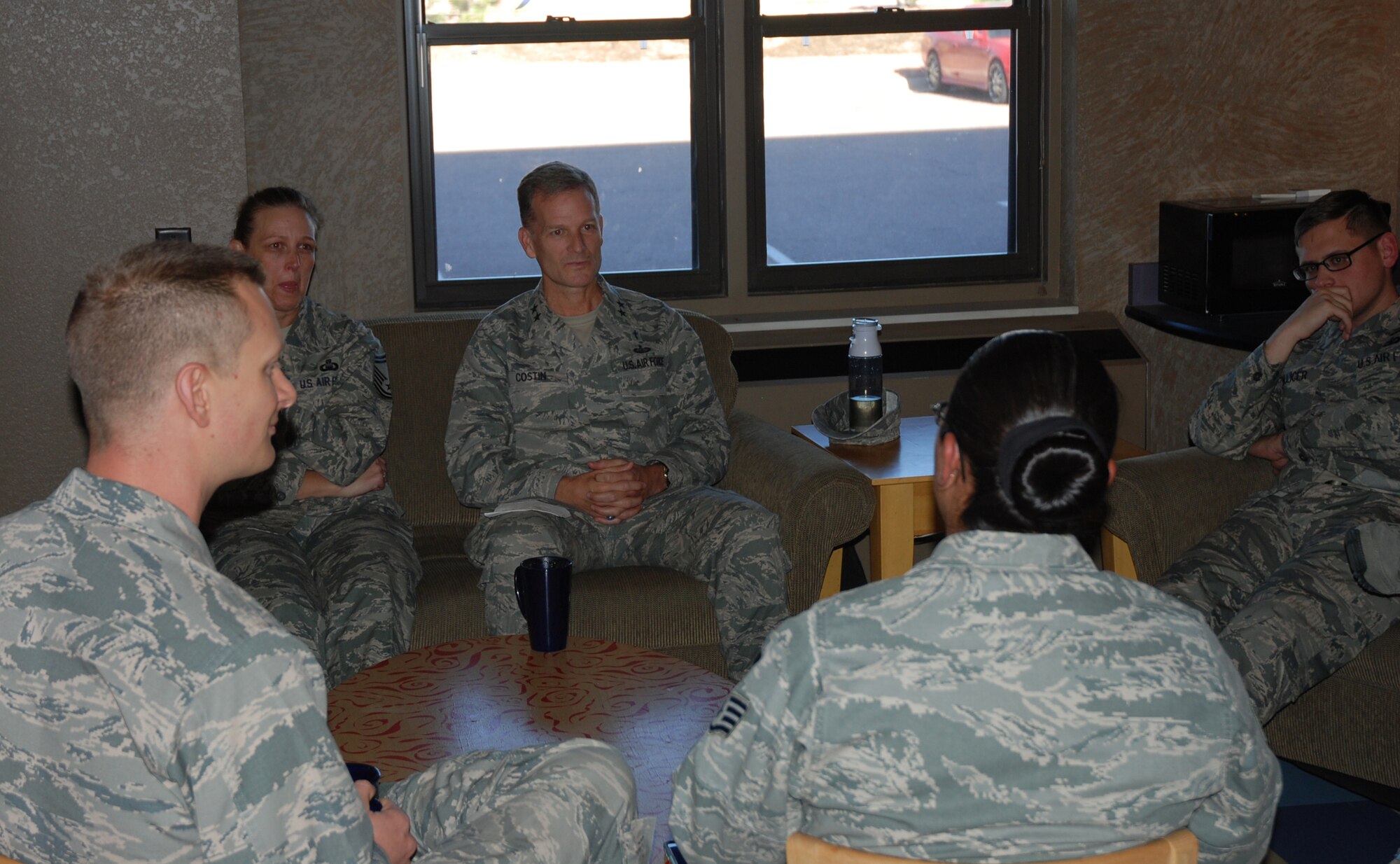 PETERSON AIR FORCE BASE, Colo. – Chaplain (Maj. Gen.) Dondi Costin, center, Headquarters U.S. Air Force chief chaplain, visited chaplains and chapel staff from Peterson and Schriever Air Force Bases, Nov. 3, 2017 at Peterson AFB, Colorado. Costin shared his perspective on issues from an Air Force-wide view while he was in town attending Corona conference meetings at the U.S. Air Force Academy. (U.S. Air Force photo by Dave Smith)