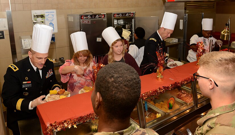 Fort Eustis leaders and family members serve Thanksgiving lunch at the Warrior Cafe on Joint Base Langley-Eustis, Va., Nov. 23, 2017.