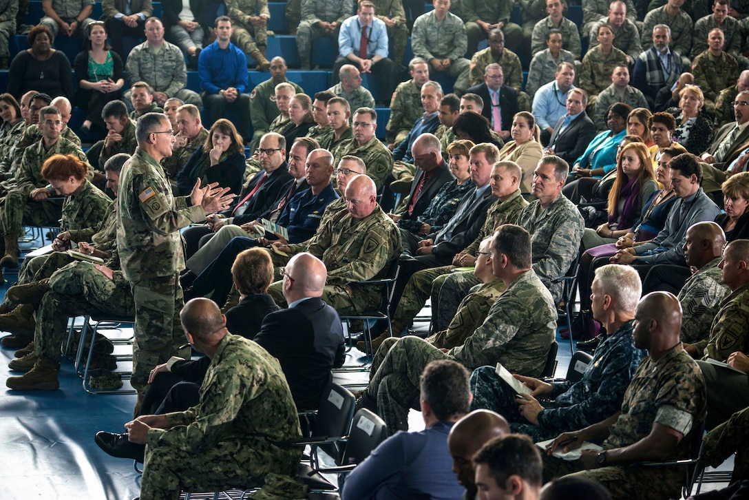 The U.S. European Command commander speaks to members of the command.