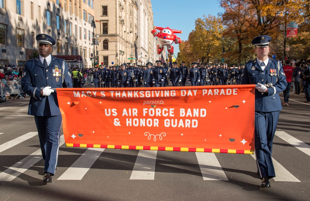 Honor Guardsmen hold banner