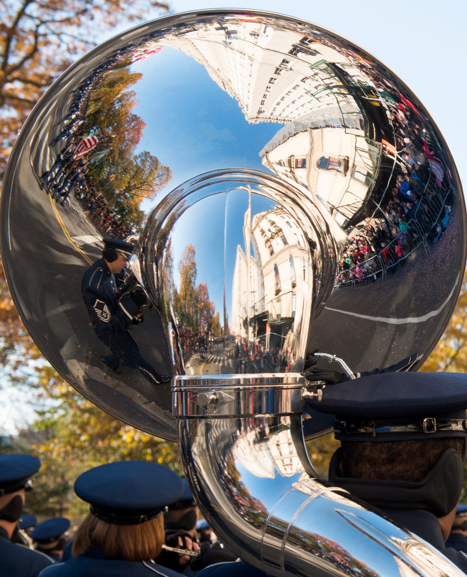 Band and Honor Guard march in parade