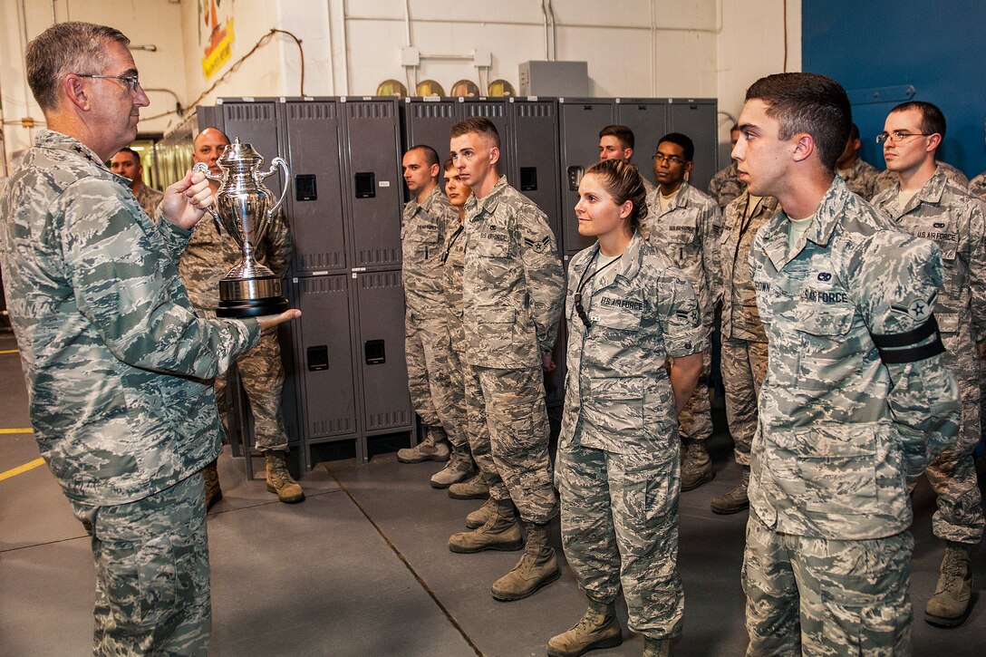 The commander of U.S. Strategic Command, speaks with airmen.
