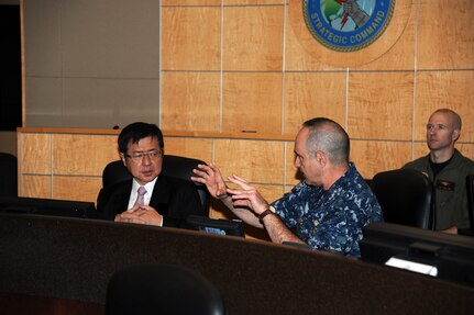 U.S. Navy Vice Adm. Charles Richard, deputy commander of U.S. Strategic Command (USSTRATCOM), explains to Nobukatsu Kanehara, deputy secretary-general of National Security Secretariat of Japan, the processes of the Global Operations Center (GOC) during a tour of USSTRATCOM on Offutt Air Force Base, Neb., Nov. 28, 2017.  During his visit, Kanehara toured the GOC and received a briefing on USSTRATCOM’s missions and priorities. One of nine Department of Defense unified combatant commands, USSTRATCOM has global responsibilities assigned through the Unified Command Plan that include strategic deterrence, space operations, cyberspace operations, joint electronic warfare, global strike, missile defense and intelligence.