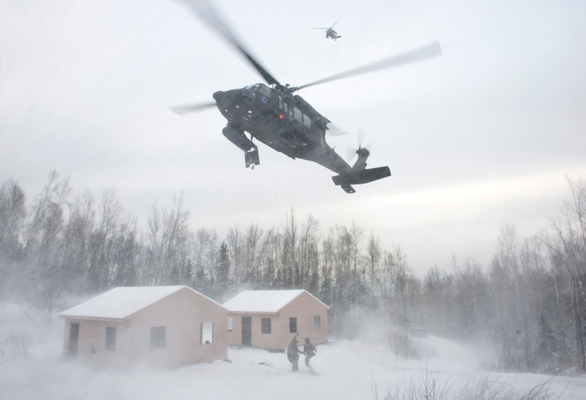 Alaska Air National Guardsmen with the 212th Rescue Squadron and Alaska Army National Guardsmen with the 1st Battalion, 207th Aviation Regiment, participate in a mass-casualty training event at Joint Base Elmendorf-Richardson, Alaska, Nov. 21, 2017.