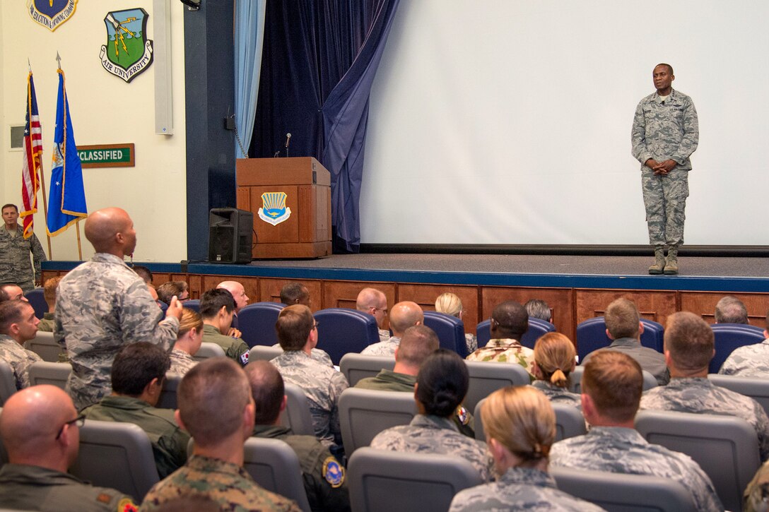 The commander of U.S. Transportation Command speaks to students.