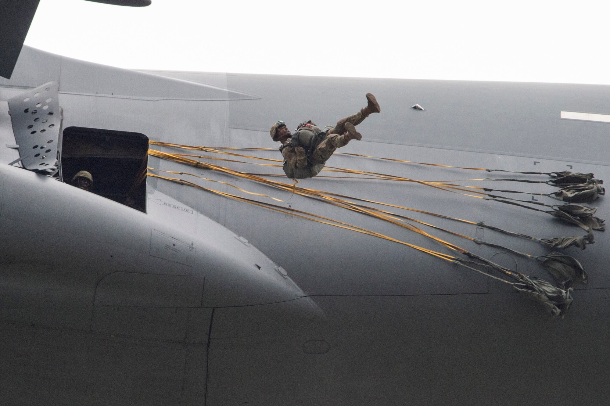 Paratroopers assigned to the 4th Infantry Brigade Combat Team (Airborne), 25th Infantry Division, U.S. Army Alaska, jump from a C-17 Globemaster III out of Joint Base Charleston, while conducting airborne training over Malemute drop zone, Joint Base Elmendorf-Richardson, Alaska, Aug. 24, 2017.