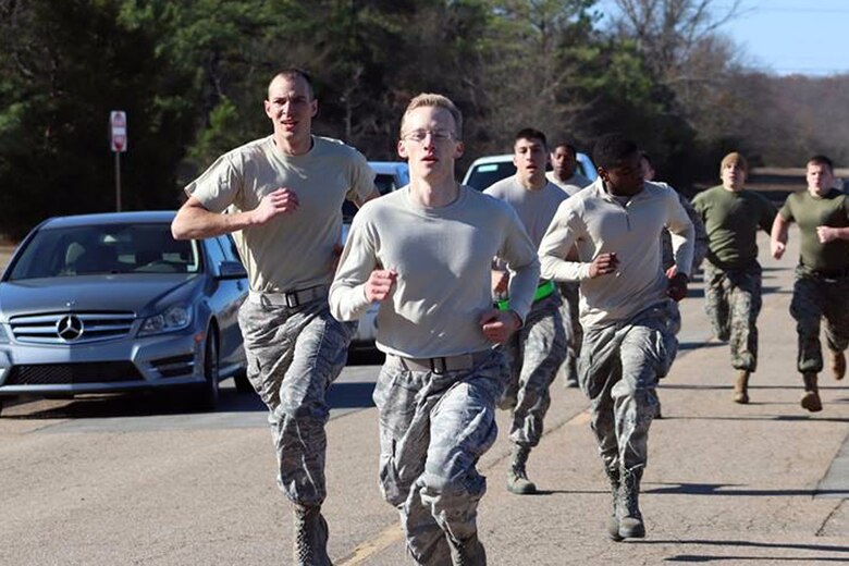 The Marine CFT requires participants in battle dress uniform, to sprint a timed 880 yards, lift a 30-pound ammunition can overhead from shoulder height repeatedly for two minutes, and perform a timed maneuver-under-fire event.