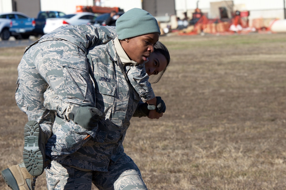 The Marine CFT requires participants in battle dress uniform, to sprint a timed 880 yards, lift a 30-pound ammunition can overhead from shoulder height repeatedly for two minutes, and perform a timed maneuver-under-fire event.