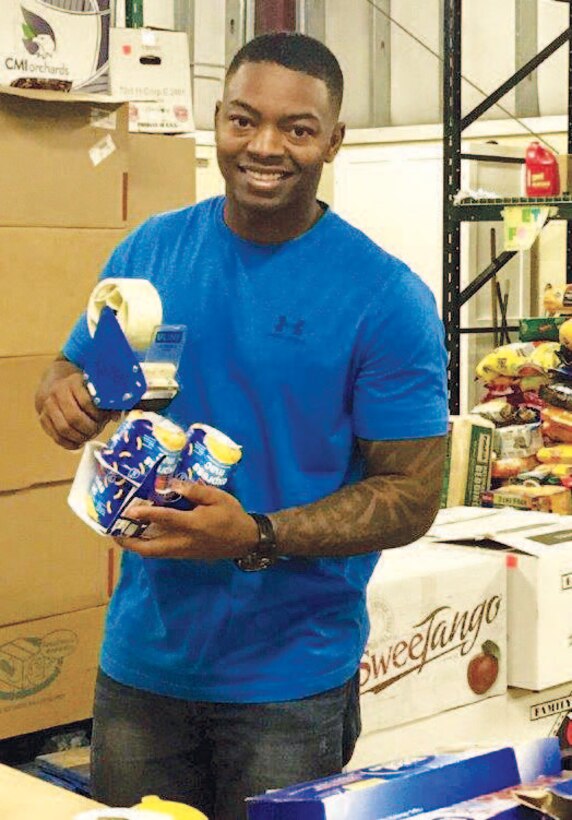 RP2 Charles Greer volunteers at the Fredericksburg Regional Food Bank.