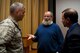 U.S. Air Force Col. Alejandro Ganster, 17th Training Group commander, talks with Dr. Yahya Michot, Hartford Seminary professor, and Anthony Celso, Angelo State University professor of security studies, after a panel discussion on ISIS at the Base Theater on Goodfellow Air Force Base, Texas, Nov. 20, 2017. Michot and Celso gave separate lectures on Islamic extremism, specifically the Islamic State of Iraq and the Levant, and then sat together and answered questions from the audience. (U.S. Air Force photo by Senior Airman Scott Jackson/Released)