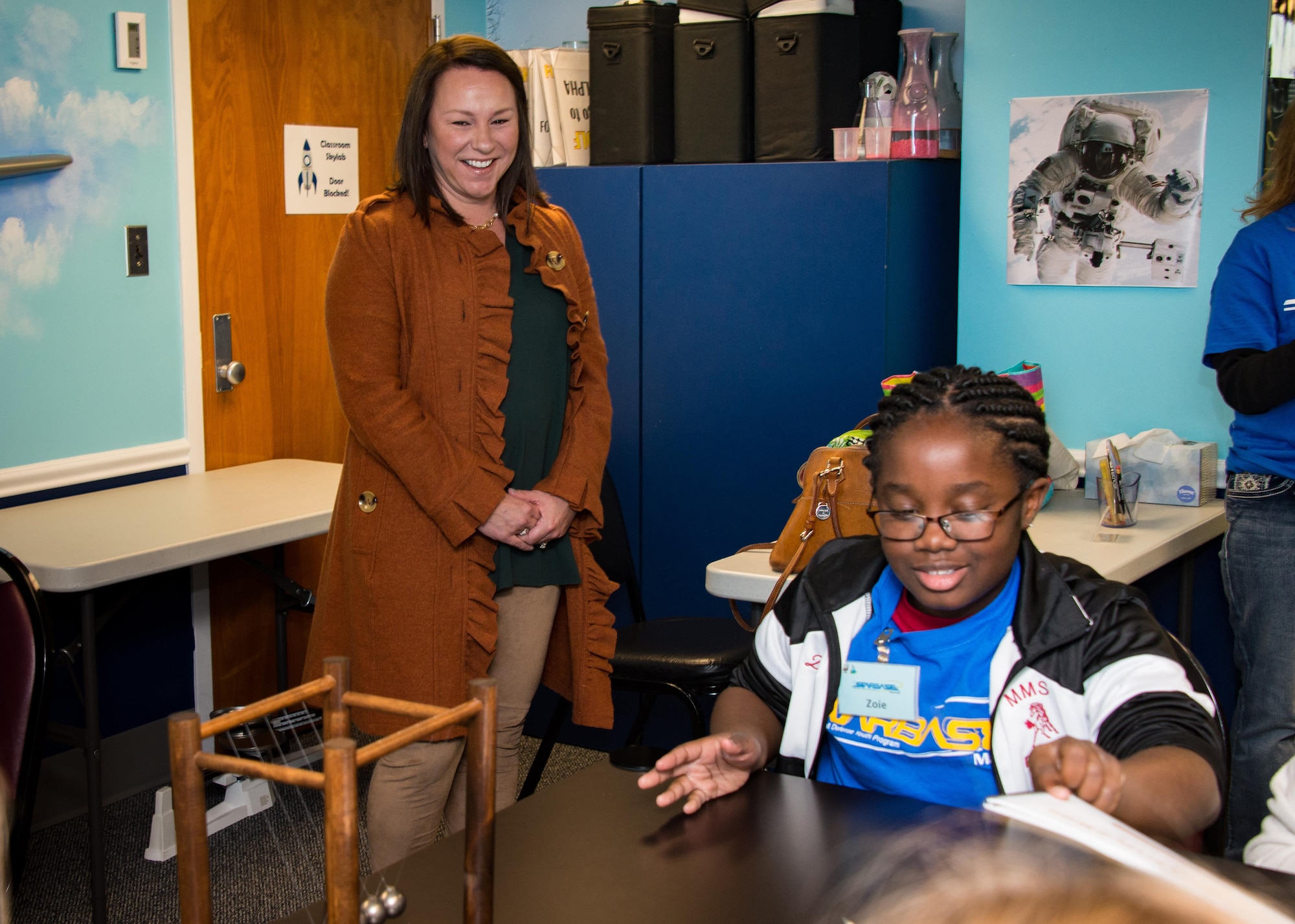 Congresswoman Martha Roby, U.S. Representative for Alabama’s Second Congressional District, looks on as a child works on science lessons regarding equal and opposite force during her first visit to STARBASE Maxwell, Nov. 27, 2017, Maxwell Air Force Base, Ala. STARBASE is a Department of Defense educational awareness and outreach program focused on providing Science, Technology, Engineering and Math lessons to fifth graders. During her visit, Roby toured the facility and experience everything the program offers to the local students. (U.S. Air Force photo by Melanie Rodgers Cox/Released.)