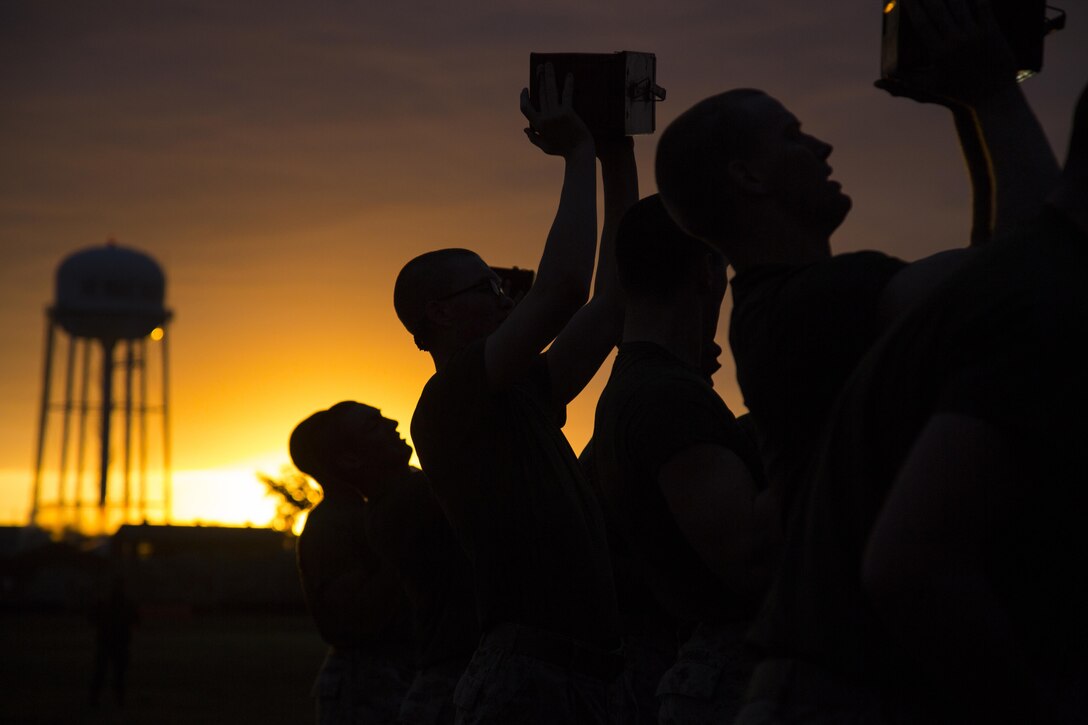 Marines participate in a combat fitness test.