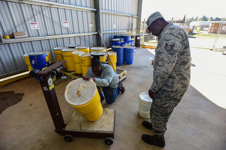 U.S. Air Force Staff Sgt. Christopher Hunter, a crew chief assigned to the 169th Aircraft Maintenance Squadron, drops off materials for disposal at the Central Acquisition Point drop-off center at McEntire Joint National Guard Base, S.C., Nov. 16, 2017. This is one of the programs that the 169th Fighter Wing at McEntire offers in order to assist in keeping the community clean by recycling excess materials. (U.S. Air National Guard photo by Senior Airman Megan Floyd)