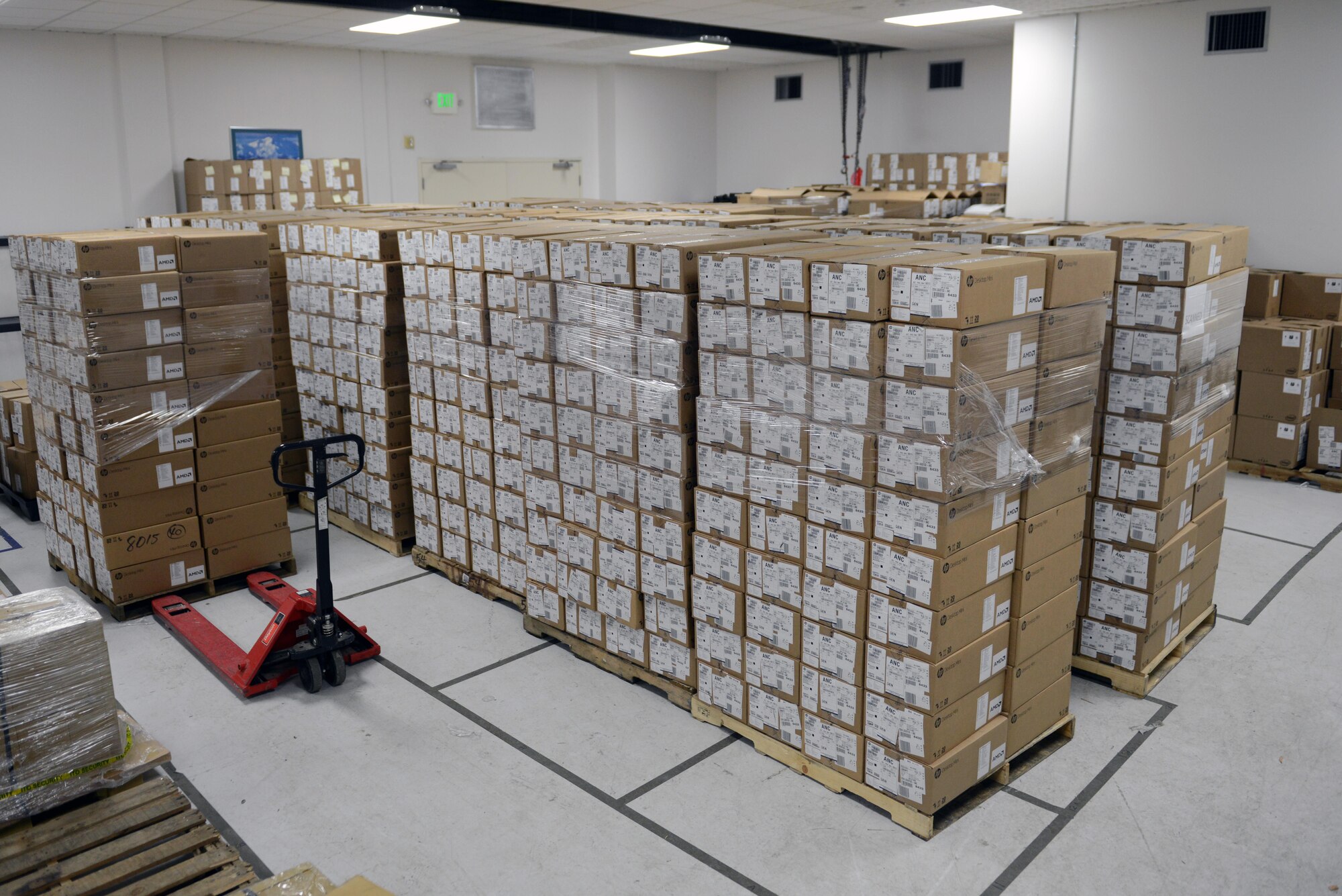 The 673d Communication Squadron houses hundreds of computers to be imaged for the Department of Defense-mandated Microsoft Windows 10 rollout project at Joint Base Elmendorf-Richardson, Alaska, Nov. 20, 2017. After the computers are imaged, they are temporarily stored in this small warehouse before being delivered to the next building ready for their computers to be replaced.